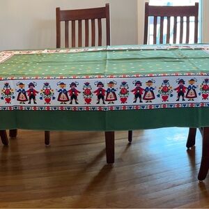 Festive Green Tablecloth with German Folk Art Design